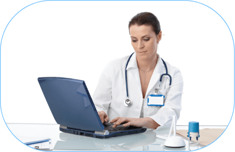 A women on a laptop in a medical setting